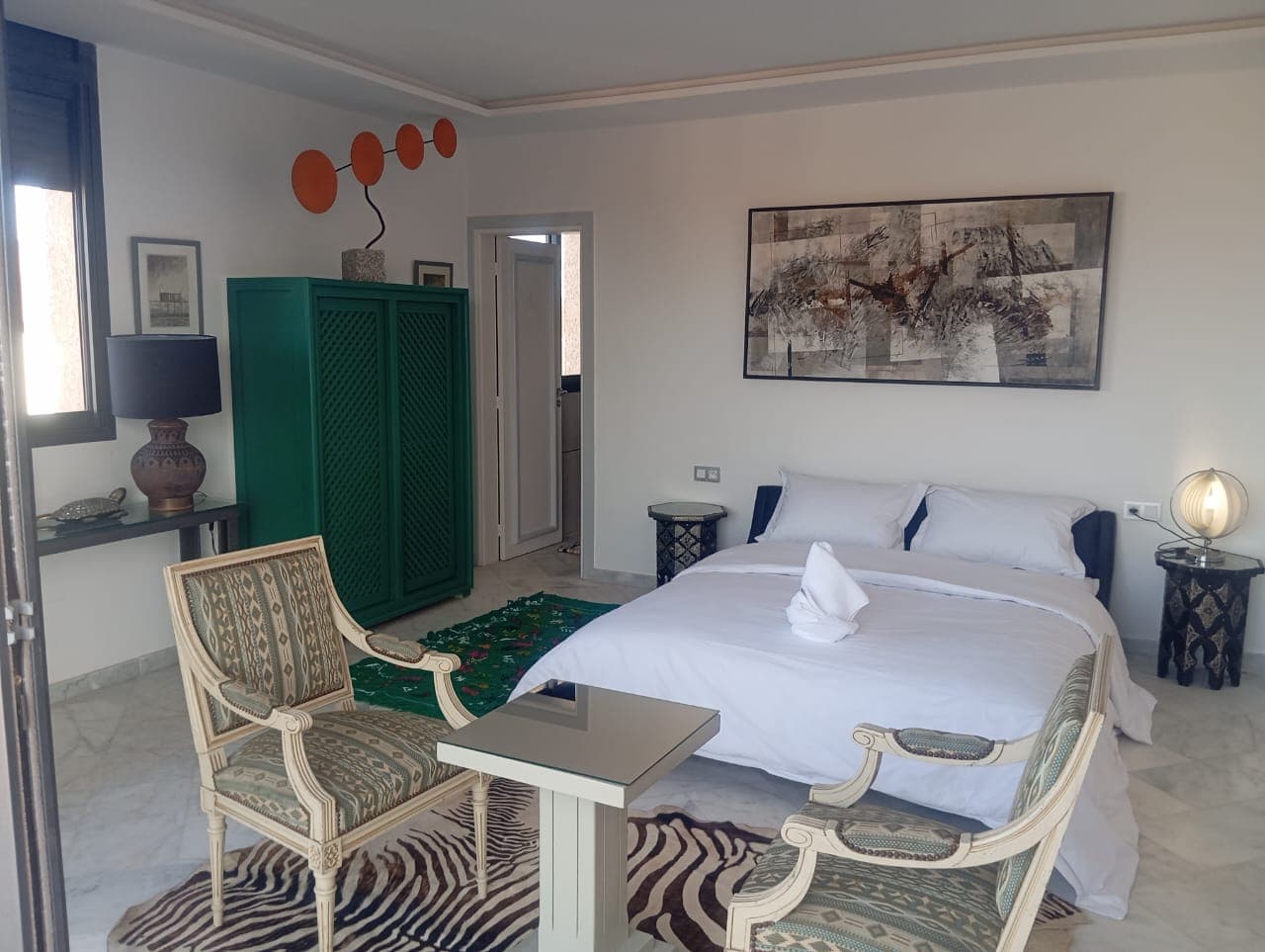 Hotel bedroom with green traditional wardrobe