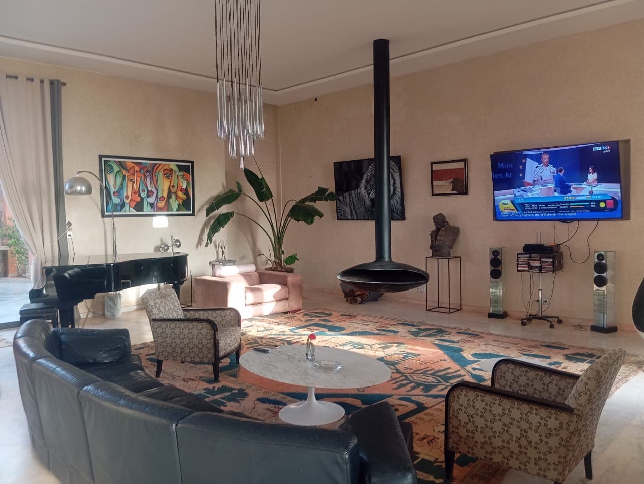 Main living room with fireplace and modern furniture