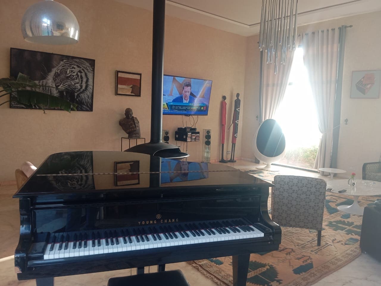 Hotel living area with grand piano
