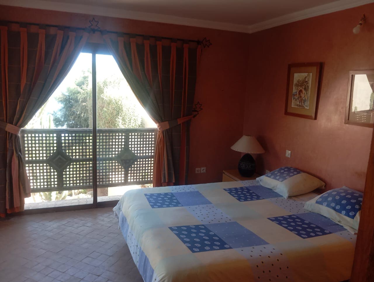 Villa bedroom with twin beds and traditional decor