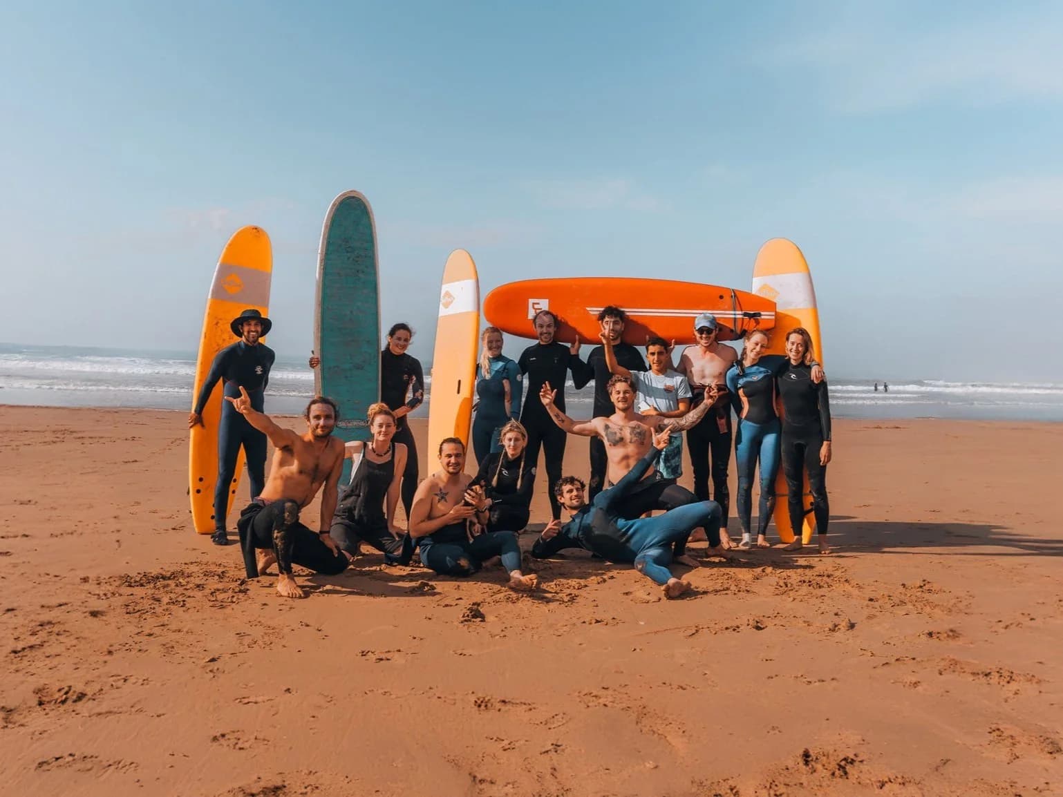 Surfing group lesson on beach